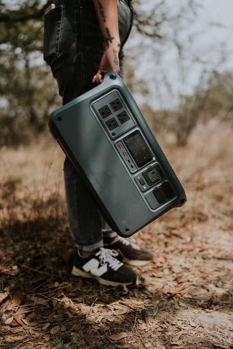 Person carrying a portable battery power station