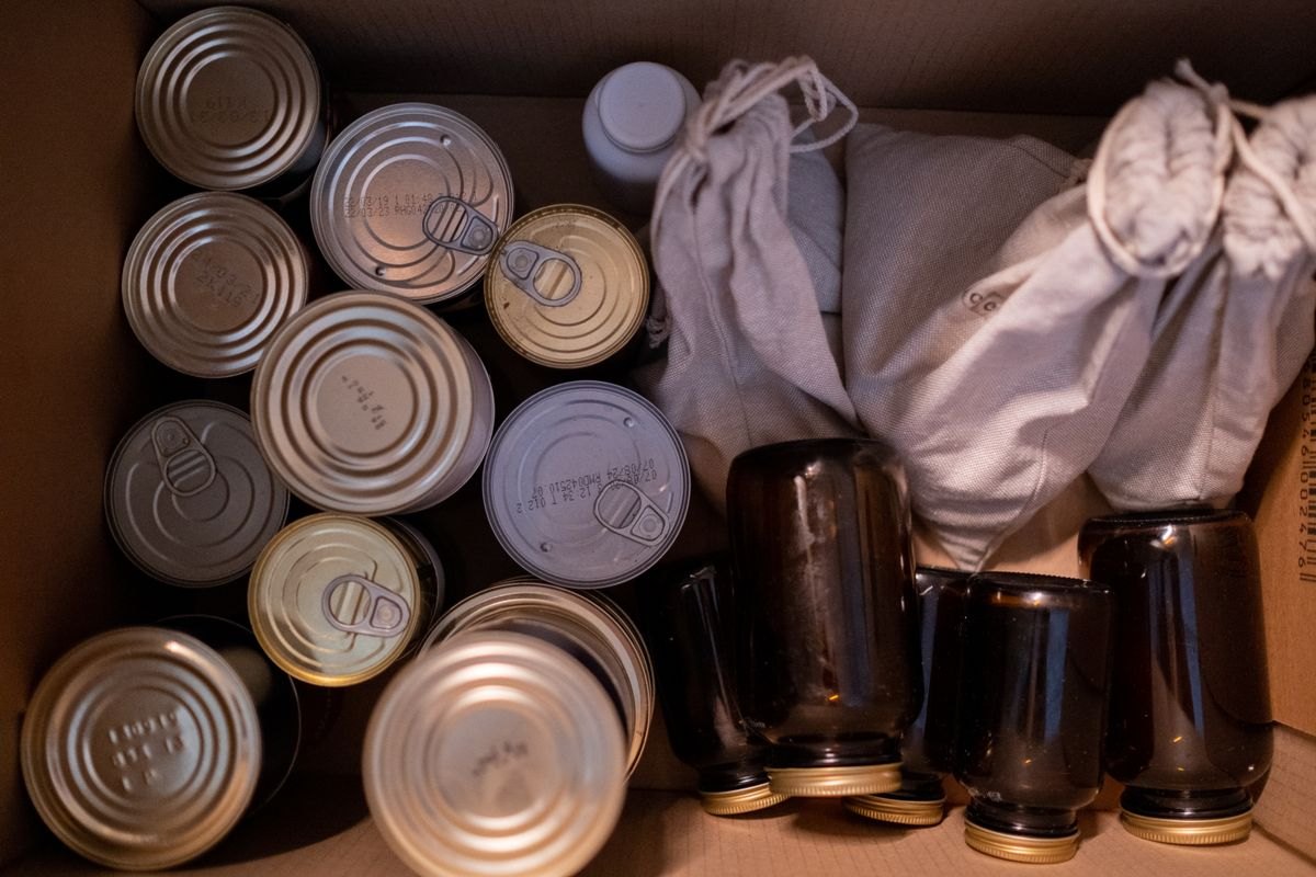 Box containing canned food and shelf-stable groceries