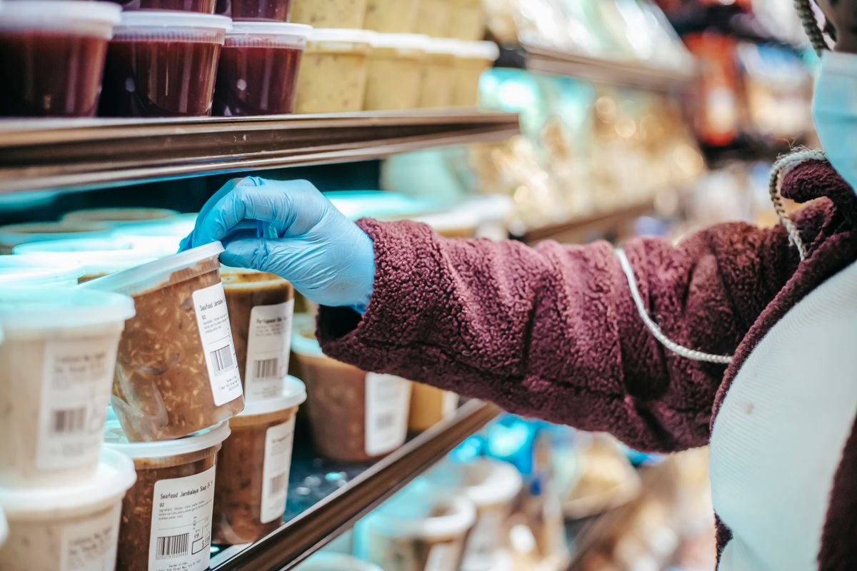 Shopper reading a packaged food label