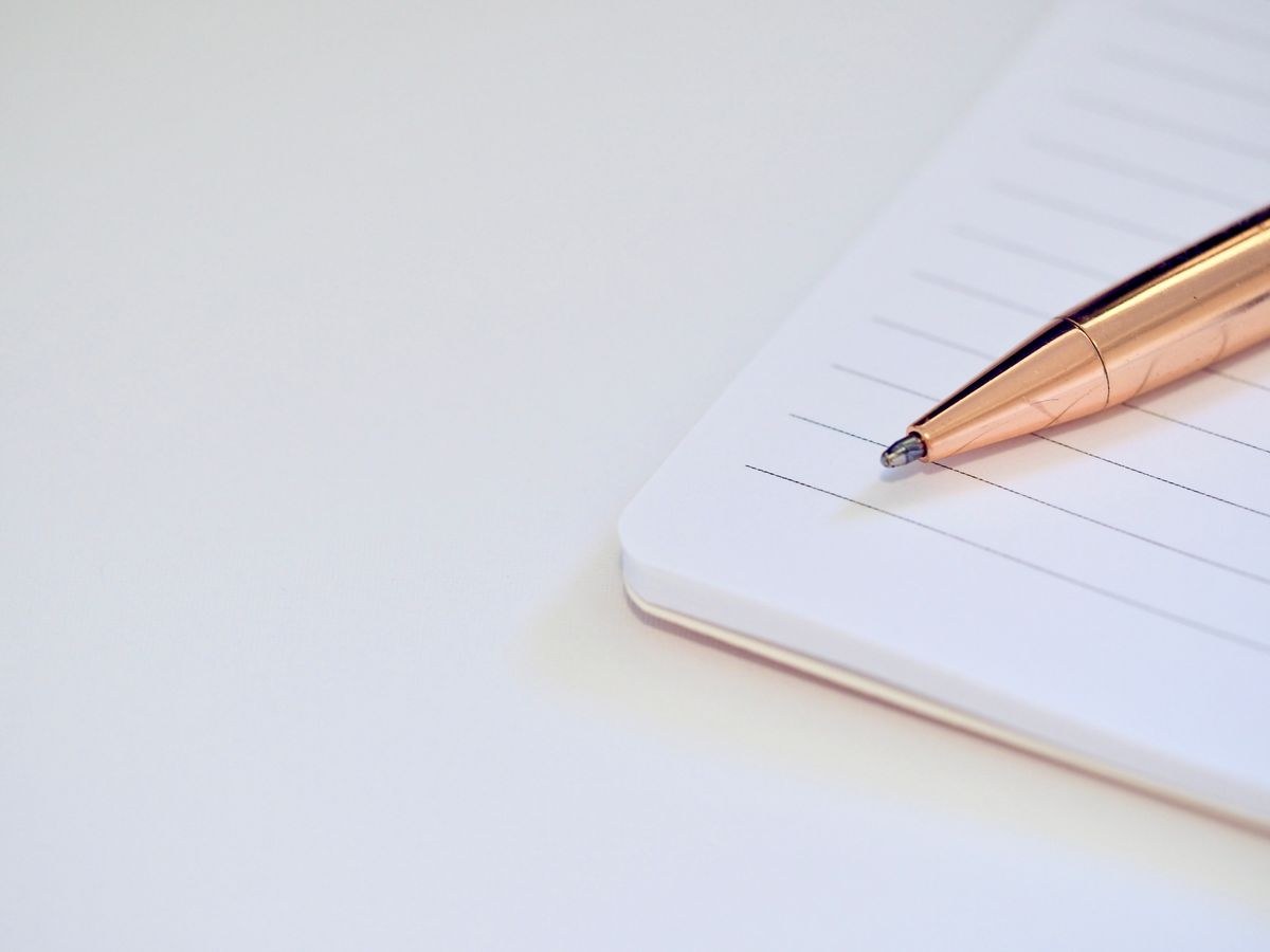 Pen resting on a notebook