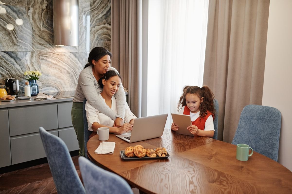 Family gathered around a table at home