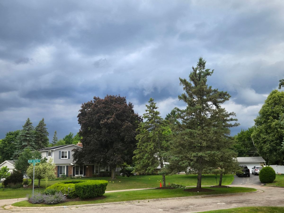 Dark storm clouds above a residential neighborhood