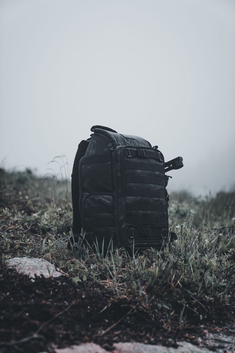 Day backpack resting on grass