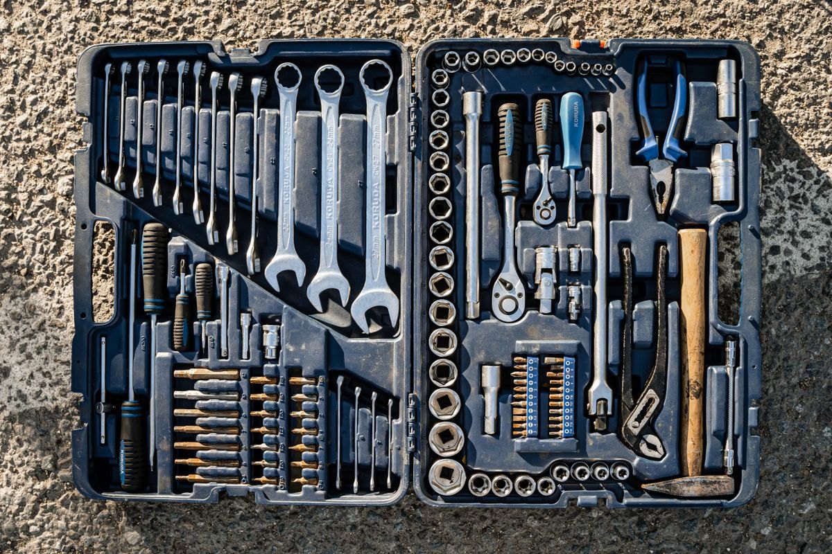 Open toolbox with assorted household hand tools